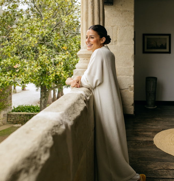 Boutique Hotel 6 Nova posing on the porch of the palace during the photo session