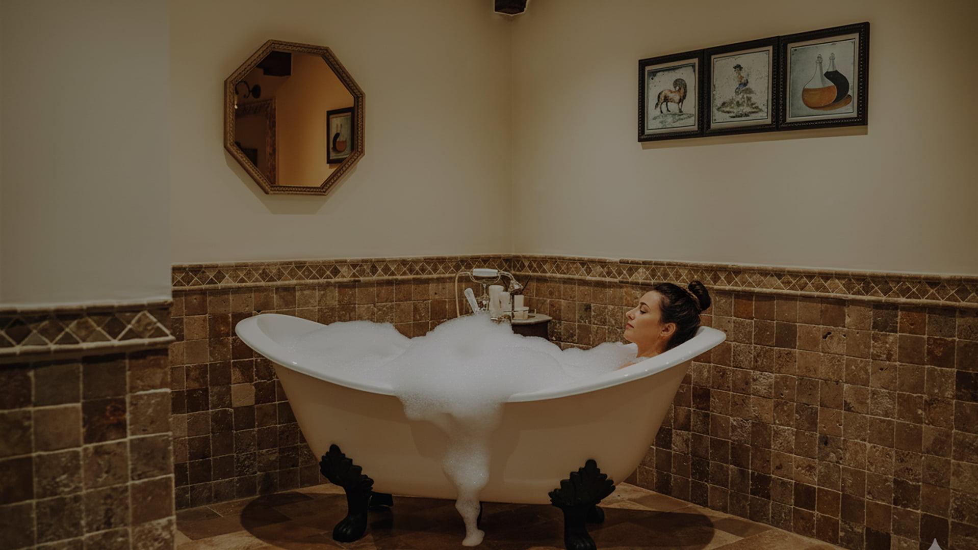 Gifts and Experiences Woman relaxing in a bubble bath