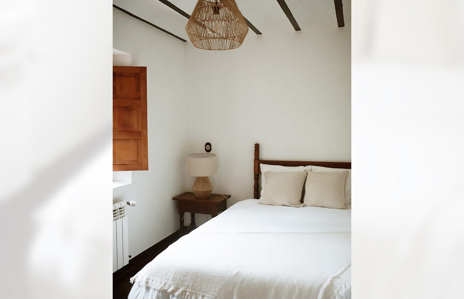 Rural House 5 Another room of the Rural House, decorated in white and wood.