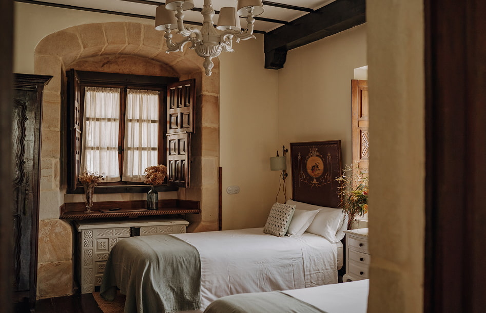 Superior Double 2 Room with two single beds next to a beautiful window.