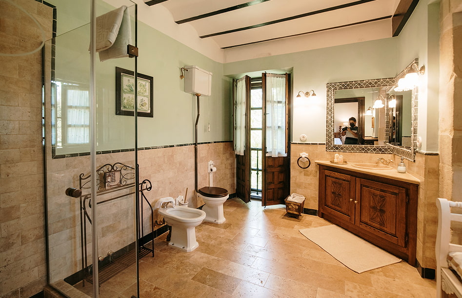 Superior Double 8 Spacious bathroom with shower and classic decor.