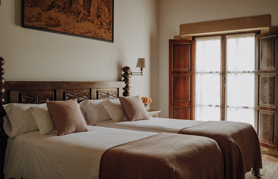 Superior Double 9 Double room with a beautiful window that illuminates the room.