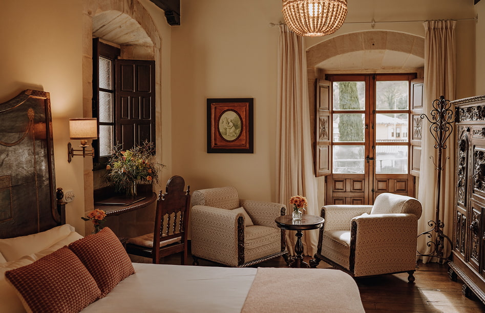 Presidential Suite 2 Side view of the room, with desk and armchairs by the window